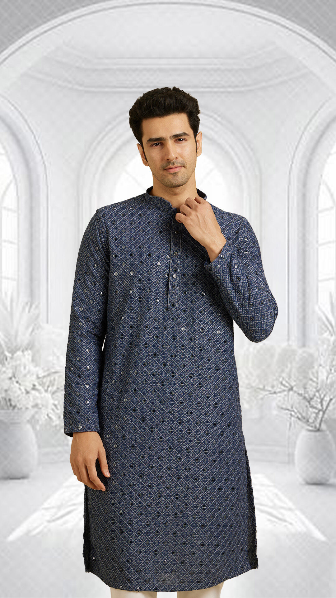 Man flaunting his stylish dark grey chikankari kurta 